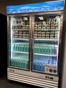 Dairy, eggs, milk in freezer inside Packed with Pride
